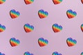 Pattern rainbow pop it fidget toy on pink background, top view