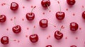 Pattern of red cherries and candy on pastel pink background, whimsical and vibrant concept Royalty Free Stock Photo