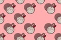 Pattern of red cups with coffee or cocoa with marshmallows with hard shadows isolated on pink background. Copy space