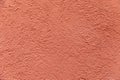 pattern of red painted plaster wall with rough structure Royalty Free Stock Photo