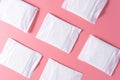 Pattern of Sanitary pad, Sanitary napkin on pink background. Menstruation, Feminine hygiene, top view Royalty Free Stock Photo