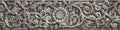 Pattern of silver metal plate with flower carved background