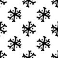 A pattern of a simple snowflake with dots. A hand-drawn snowflake with six rays in the style of doodles with black dots is often