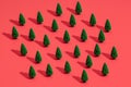 Pattern of miniature-pine trees on a red-background. Royalty Free Stock Photo