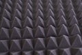 The pattern of the soundproof panel of polyurethane foam. black geometric background