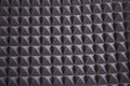 The pattern of the soundproof panel of polyurethane foam. black geometric background