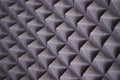 The pattern of the soundproof panel of polyurethane foam. black geometric background