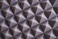 The pattern of the soundproof panel of polyurethane foam. black geometric background