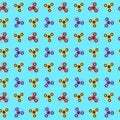 Pattern of spinners in a flat style. Multicolored spinners spin on a blue background. A modern antistress toy for recreation. Play Royalty Free Stock Photo