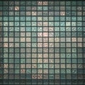 A pattern of square glass blocks, arranged in a grid. Each block has a textured Royalty Free Stock Photo