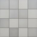 Pattern of 16 square tiles arranged in a 4x4 grid. Each tile is a shade of gray, creating a subtle Royalty Free Stock Photo