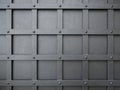 Pattern of squares grid on a gray iron door Royalty Free Stock Photo