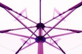 The pattern of steel frame umbrella underside detail with white cloth roof Royalty Free Stock Photo