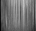 Pattern of steel rods against a rough wall -