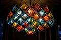 The pattern on the surface of a chandelier, is made up of triangles, squares, rectangles