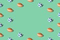 Pattern texture made of soccer and american football balls abstract on pastel green