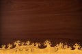 Pattern thai carve wave gold on wood texture Royalty Free Stock Photo