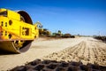 Trace of huge road roller with spikes to compact soil at construction site Royalty Free Stock Photo