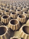 Pattern of unfinished clay pots in pottery factory.