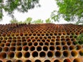 Pattern view of concrete pipes as farden decorarion at Botanical Garden Putrajaya. Dsign and exterior designs concept Royalty Free Stock Photo