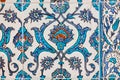 Pattern of vintage ceramic tiles on wall of historical Topkapi palace, Istanbul. Royalty Free Stock Photo