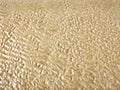Beautiful pattern of wet sand at Mandarmani, West Bengal, India.