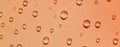 Pattern of water drops on a beige background