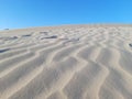 Pattern waves with footprints in sand dunes