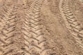 wheels tracks on the soil Royalty Free Stock Photo