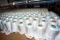 A pattern of white cotton spools with threads. An old system manual loom machine for clothing Royalty Free Stock Photo