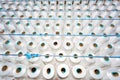 A pattern of white cotton spools with threads. An old system manual loom machine for clothing Royalty Free Stock Photo