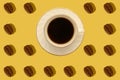 Pattern. White cup of black coffee with black coffee beans. Royalty Free Stock Photo