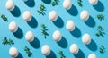 Pattern of White Easter Eggs and Green Twigs on a Blue Background white eggs spring Royalty Free Stock Photo