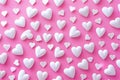 pattern of white hearts on a pink background with a border of small hearts