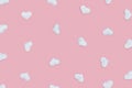 Pattern from white hearts, symbols of love on pink fon. Holiday background for Valentines Day. Love concept Royalty Free Stock Photo