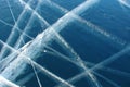 Pattern of white intersecting lines in the dark-blue ice Royalty Free Stock Photo