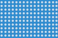 Pattern of white round pills on blue background, top view, flat lay Royalty Free Stock Photo