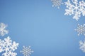 Pattern White Snowflake On Blue Background. Christmas Decor With Copy Space