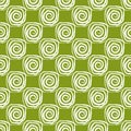 Pattern of white spirals on a green background