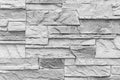pattern of white stone cladding wall tile texture and seamless background Royalty Free Stock Photo