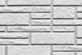 Pattern of white stone cladding wall tile texture and seamless background Royalty Free Stock Photo