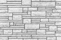 Pattern of white stone cladding wall tile texture and seamless background Royalty Free Stock Photo