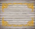 Pattern of wood carve flower gold frame on wood Royalty Free Stock Photo