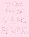 Pattern of word SPRING made of cherry petals on pink background Royalty Free Stock Photo