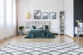 Patterned carpet in bright bedroom Royalty Free Stock Photo