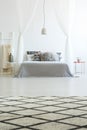 Patterned carpet in spacious bedroom Royalty Free Stock Photo