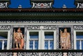 Patterned facade of a Baroque building with portrait of Karel IV, King of Bohemia