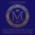 Patterned gold letters and numbers with initial monogram.