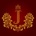 Patterned golden letter J monogram in vintage style. Heraldic coat of arms. Baroque logo template