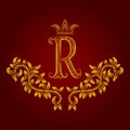 Patterned golden letter R monogram in vintage style. Heraldic coat of arms. Baroque logo template